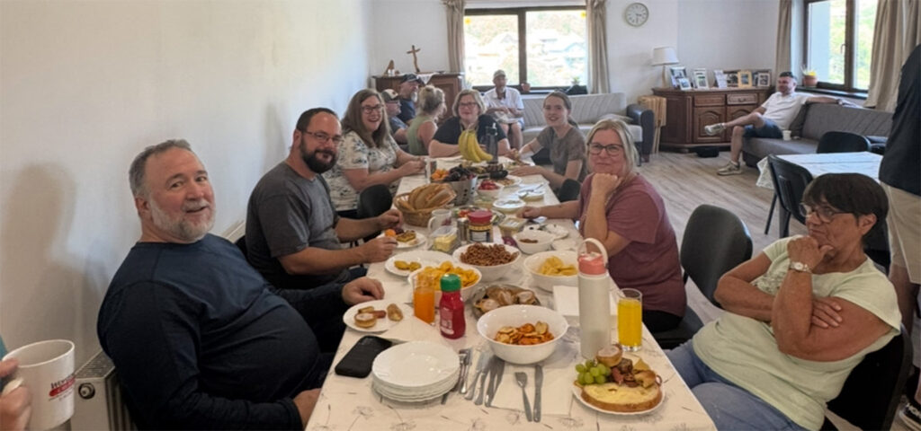 The Romania mission team sharing a meal together. 