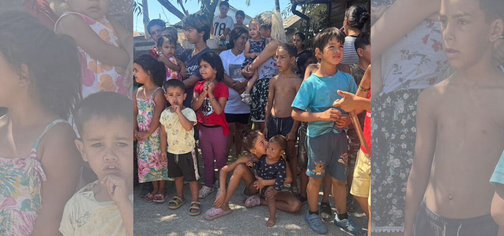 Romanian children who live in a landfill community. 